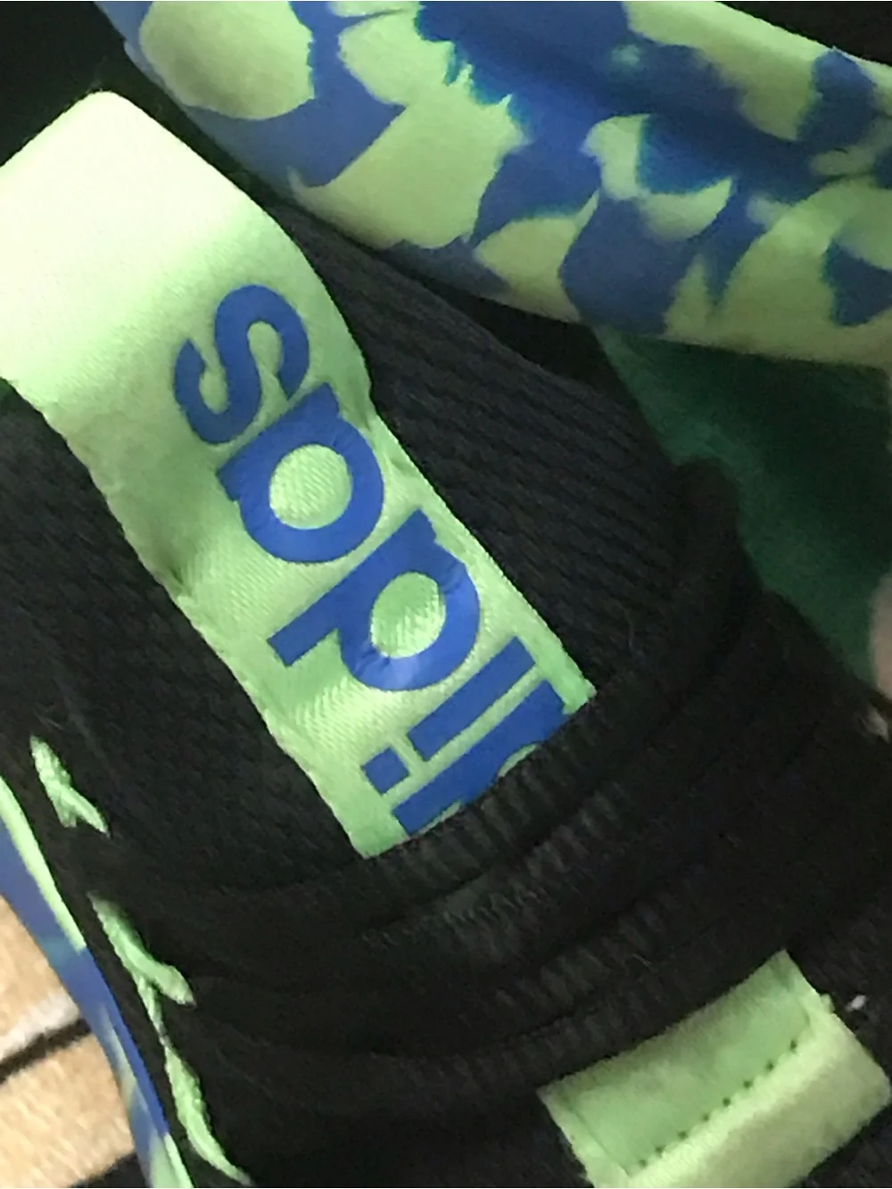 Adidas Kids Black Sneakers with Neon Green and Blue Patterned Sole